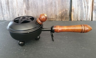 Metal incense burner with pentagram and wooden handle